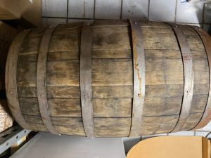 Used Oak Barrels, with fastened metal bands